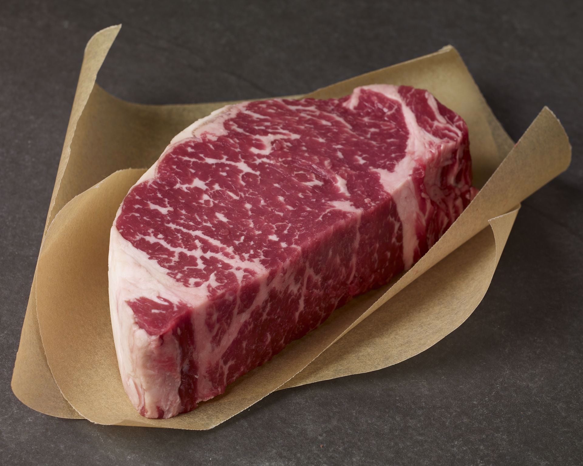 Bone In New York Strip Steak AUS Crimson Crest 8/9 Wagyucross