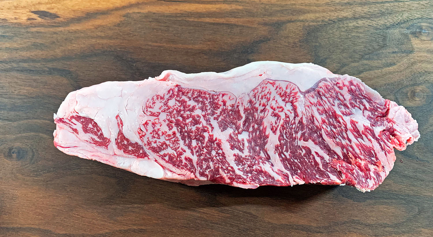 New York Strip Aus CrimsonCrest 6+ Wagyu F1 Crossbred