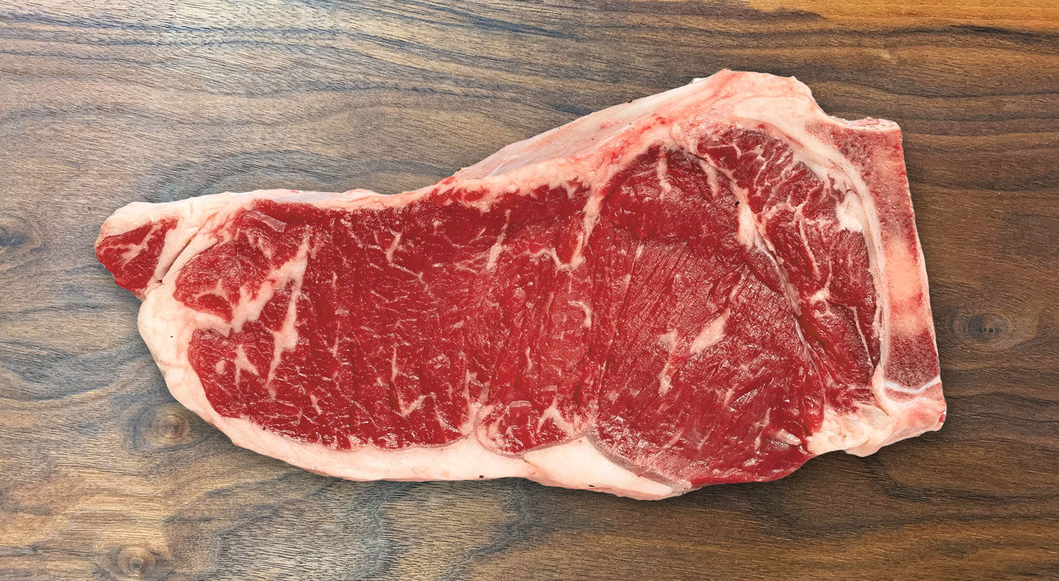 Bone In Striploin Steak Crimson Crest 3+ Black Angus