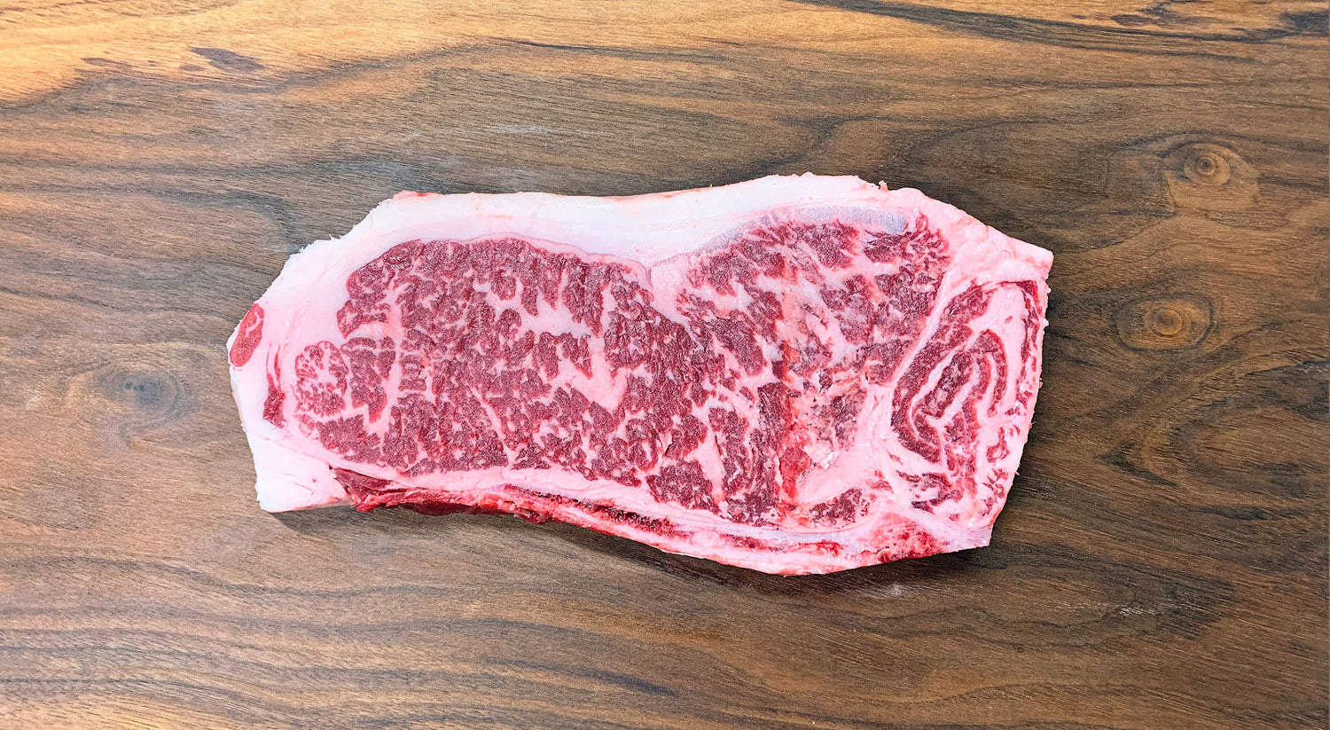 Bone In Striploin Steak Crimson Crest 5+ Wagyu F1 Crossbred